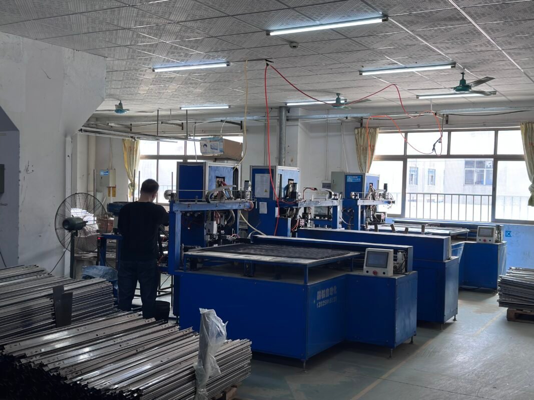 Automated LED tube bracket production line at Yuto Lighting factory